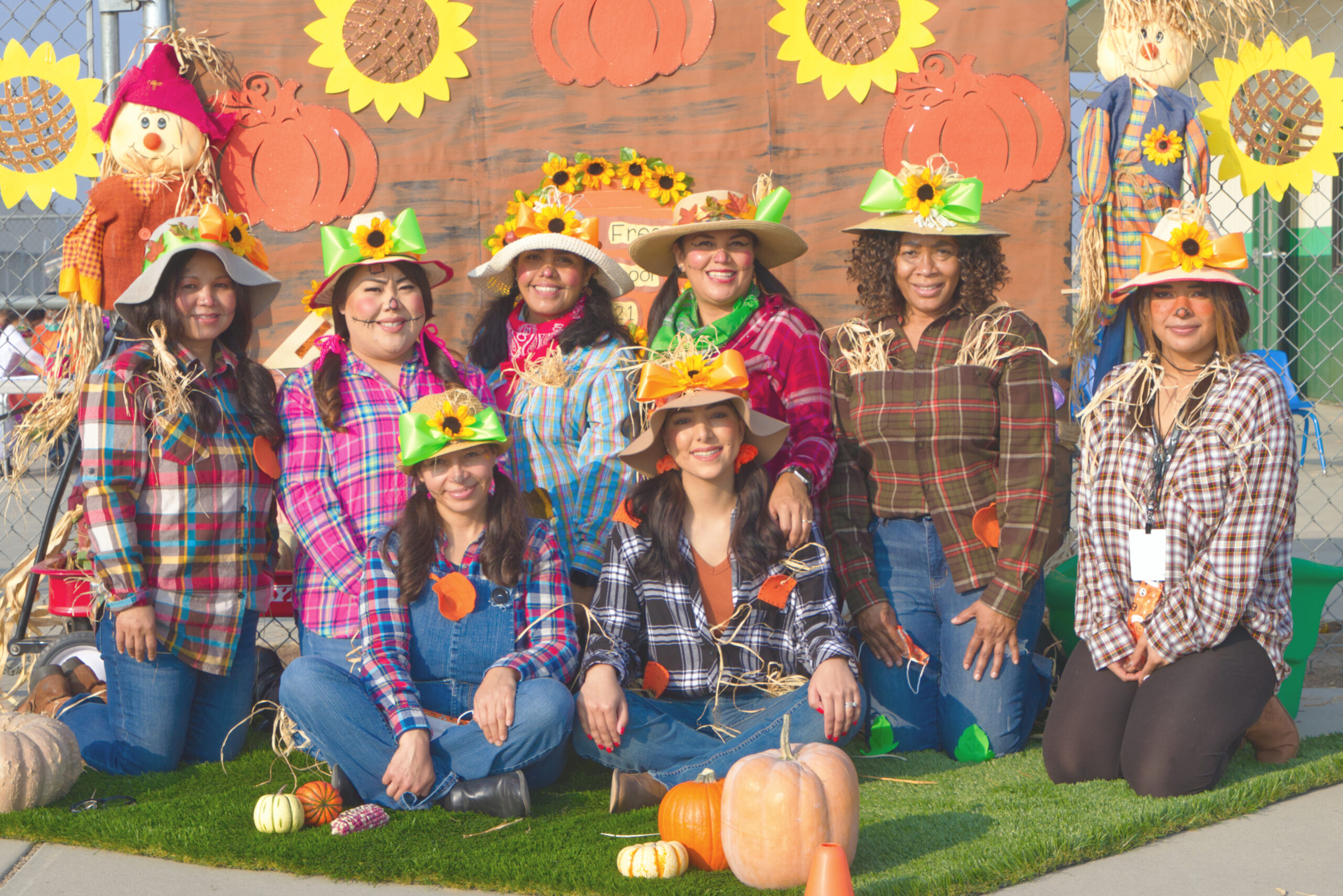 Picture of teachers in their halloween outfits (scarecrows)